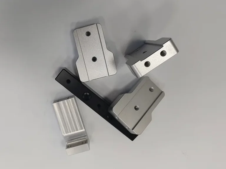 Clear-anodized automation brackets + black bar + ribbed clamp, view 1