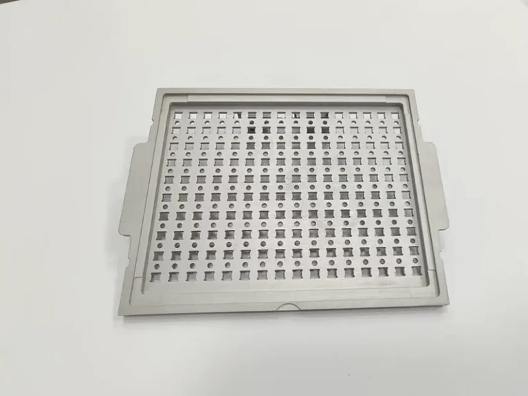 Perforated carrier plate + matching pocketed nest plate, view 1