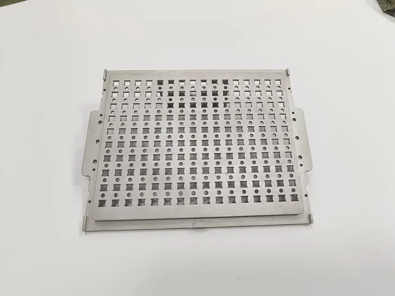 Perforated carrier plate + matching pocketed nest plate, view 2