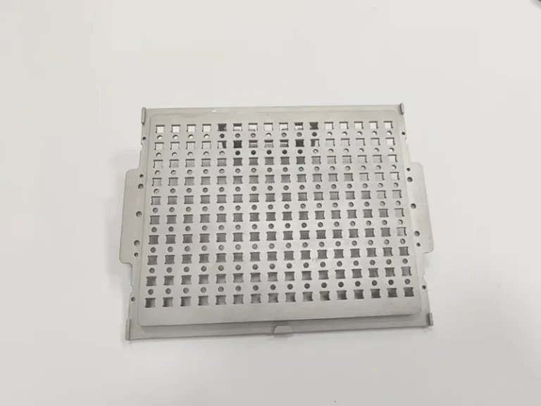 Perforated carrier plate + matching pocketed nest plate, view 3