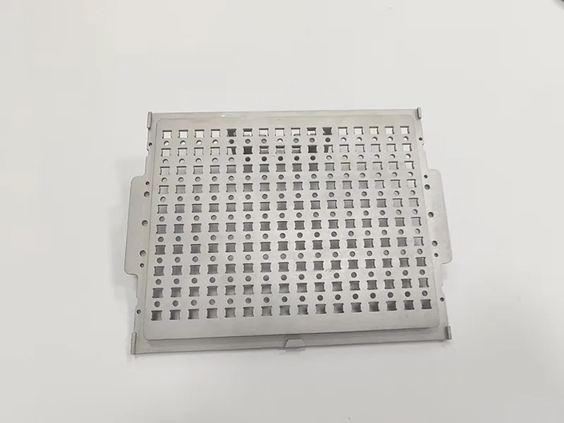 Perforated carrier plate + matching pocketed nest plate, view 3