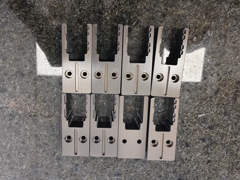 8x comb-slot carrier blocks on a granite plate, view 2