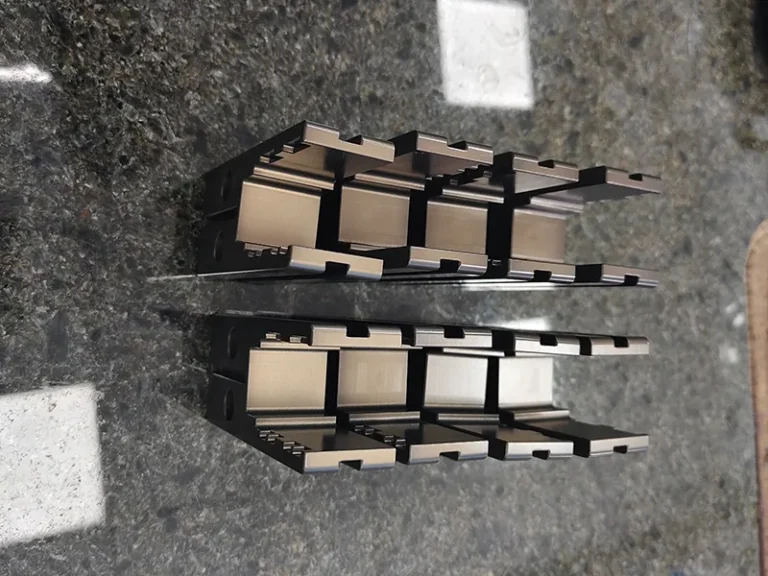 8x comb-slot carrier blocks on a granite plate, view 5