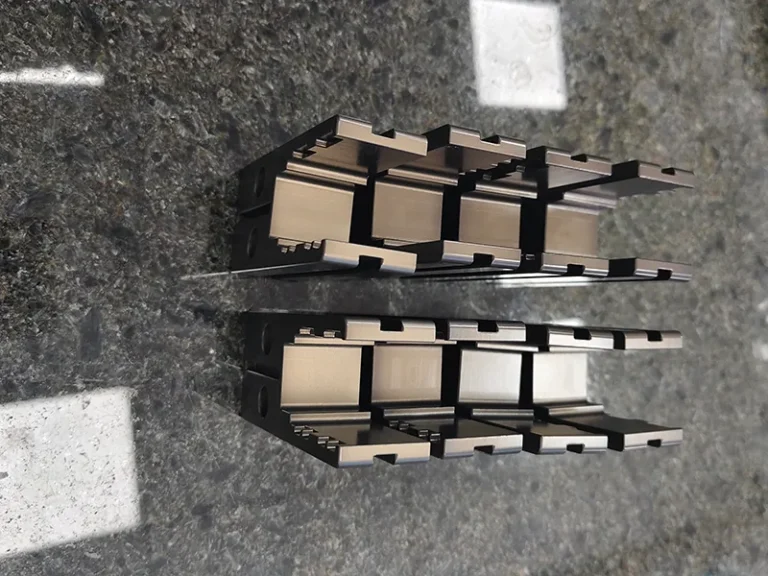 8x comb-slot carrier blocks on a granite plate, view 6