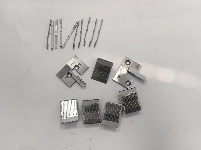 Connector stamping die blade insert set and formed contact blades cut by wire EDM