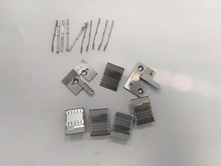 Connector stamping die blade insert set + formed contact blades (wire EDM), view 2