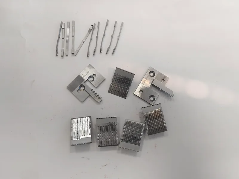 Connector stamping die blade insert set + formed contact blades (wire EDM), view 2